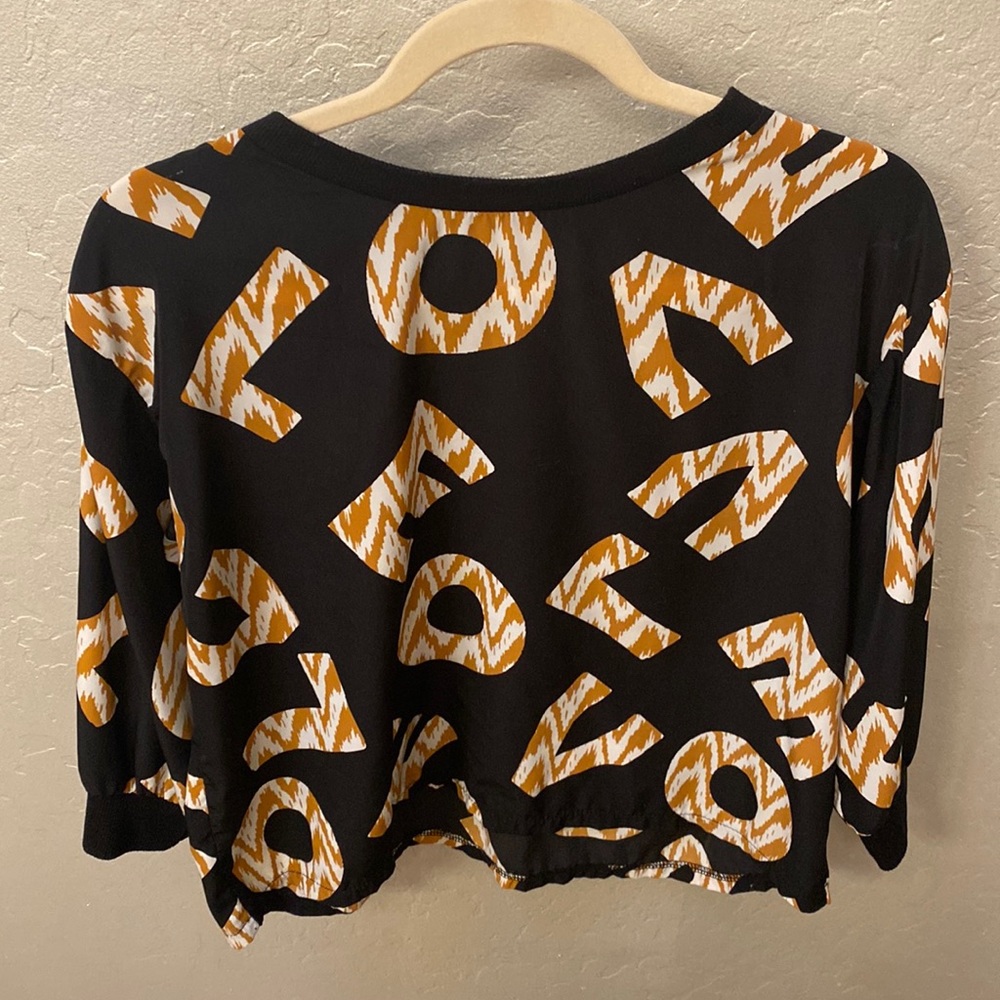 Lush ‘love’ quarter length top